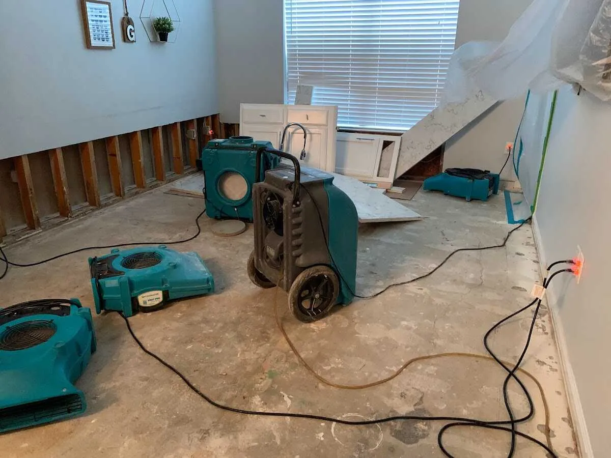 Dehumidifier in flood-cut room for Water Damage Restoration in Tomah
